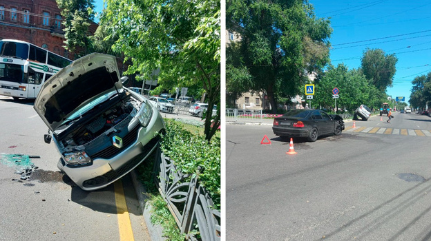 В Воронеже после ДТП иномарка повисла на заборе: пострадали двое