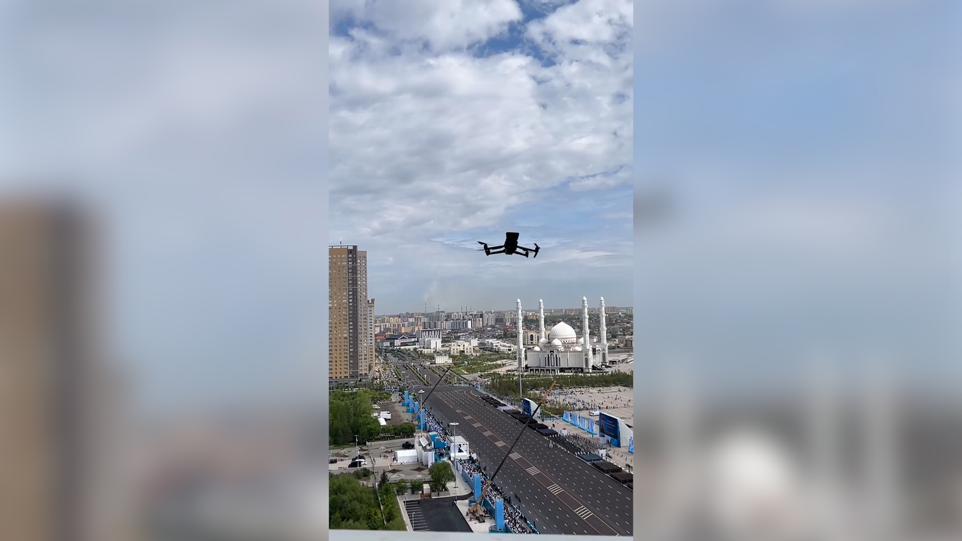 Дрон потребовал от жительницы Астаны прекратить съемку военного парада